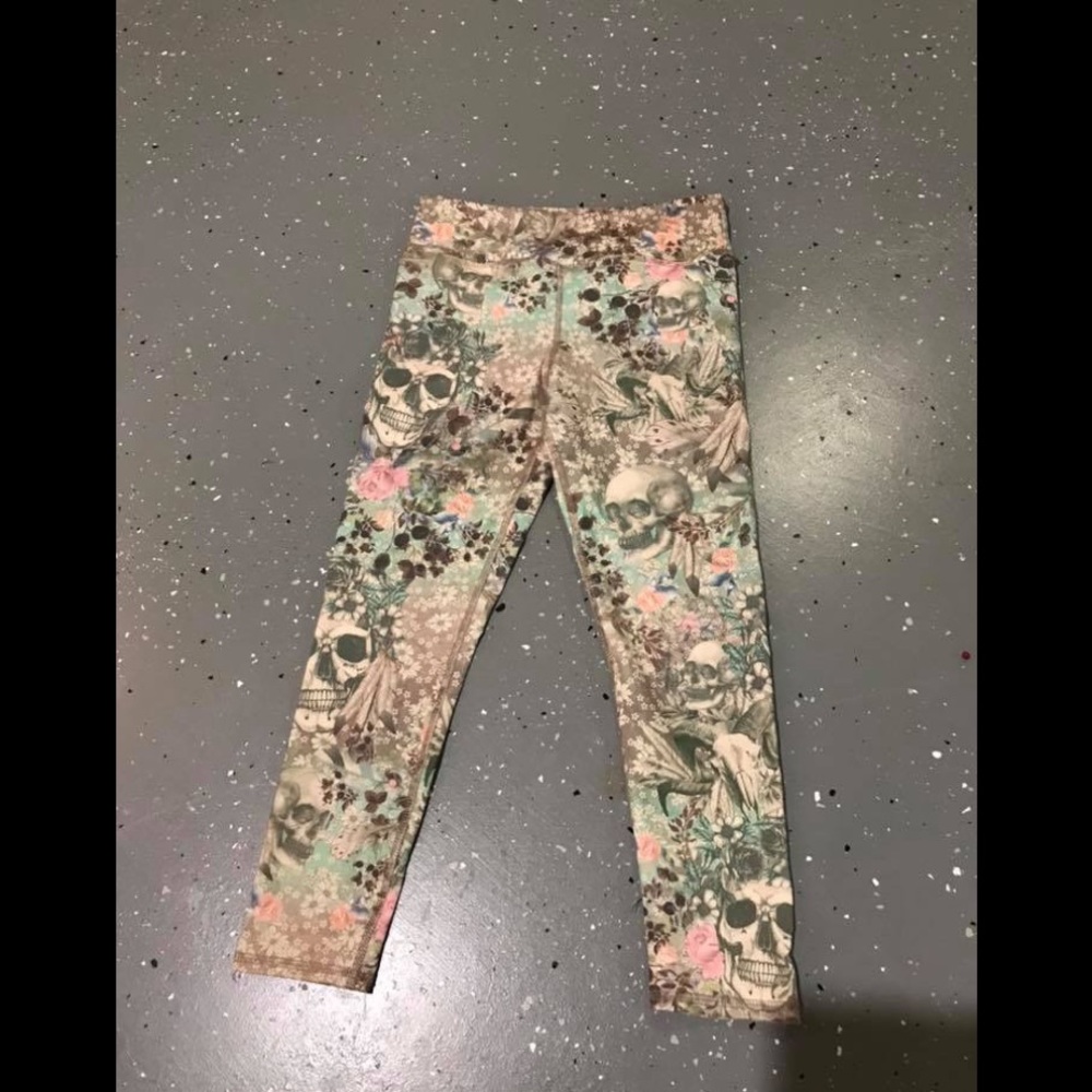 Evolution and Creation skull workout capris
